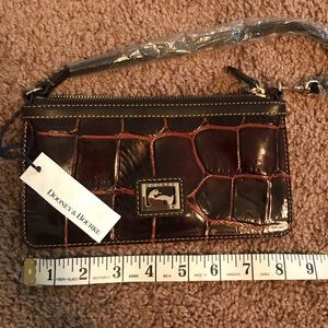 Never used Dooney&Bourke large slim wristlet